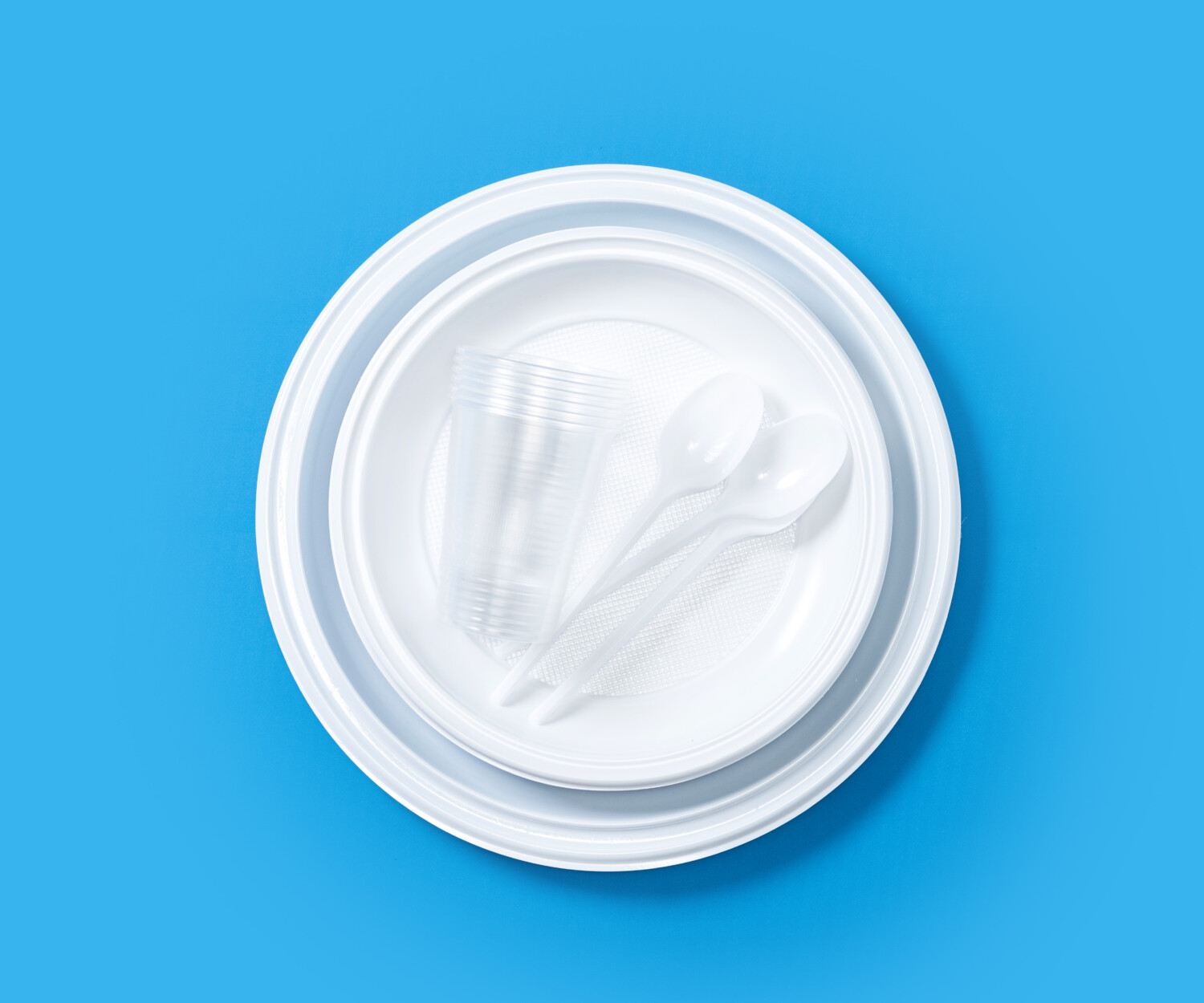 Disposable waste plastic pattern on blue background