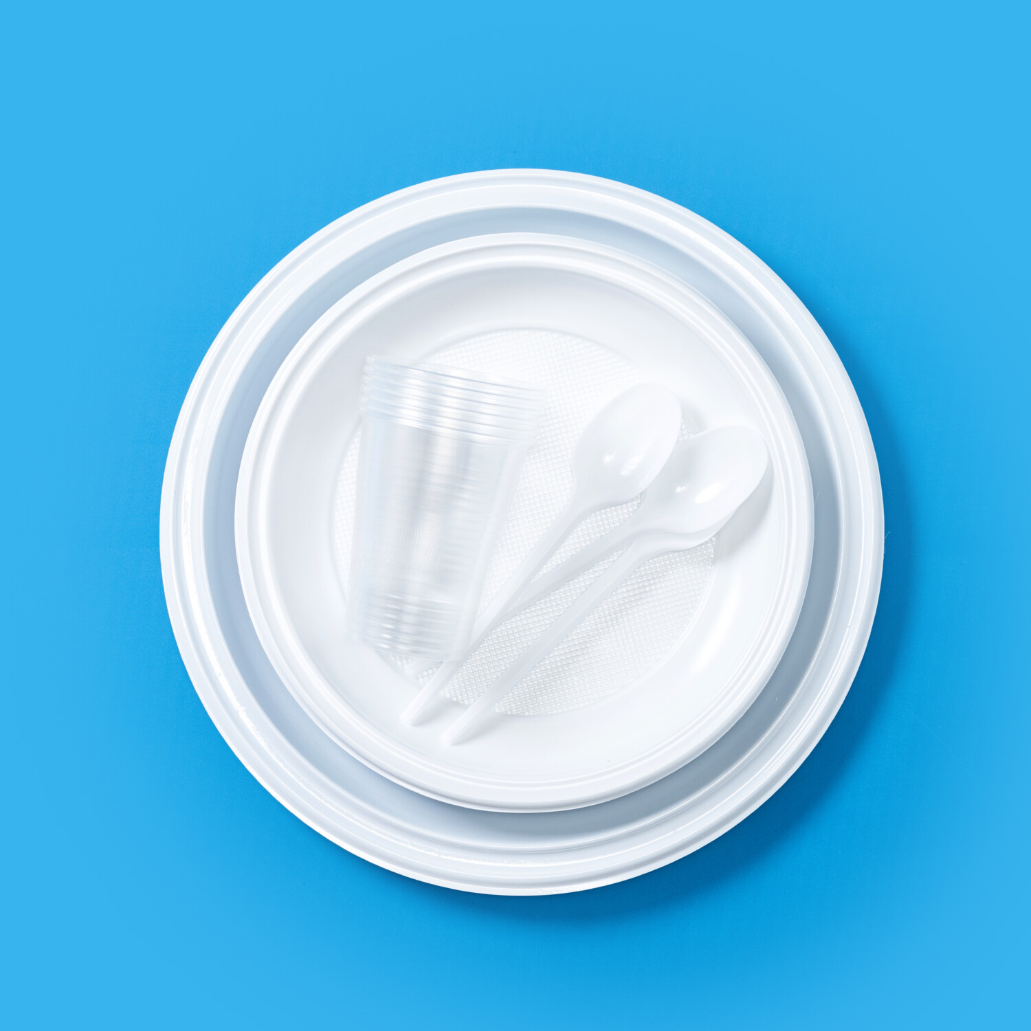 Disposable waste plastic pattern on blue background