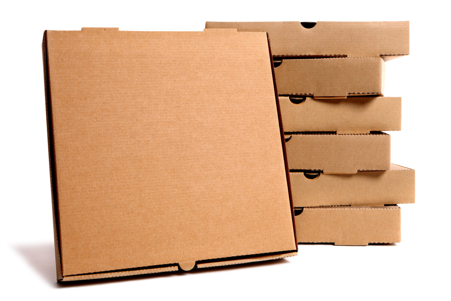 Stack of plain brown pizza boxes with one front facing box for display or advertising.  Isolated on white background.  Copy space.